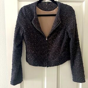 From Nordstrom. Size S. Dark bluish color/ bronze sparkles. Silver zip/Lined.